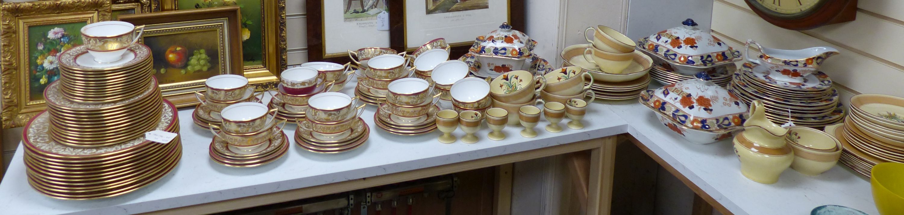 A Mintons breakfast set, a Minton part dinner service and a Woods floral-patterned part dinner service